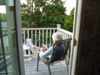 Mary relaxing on the balcony